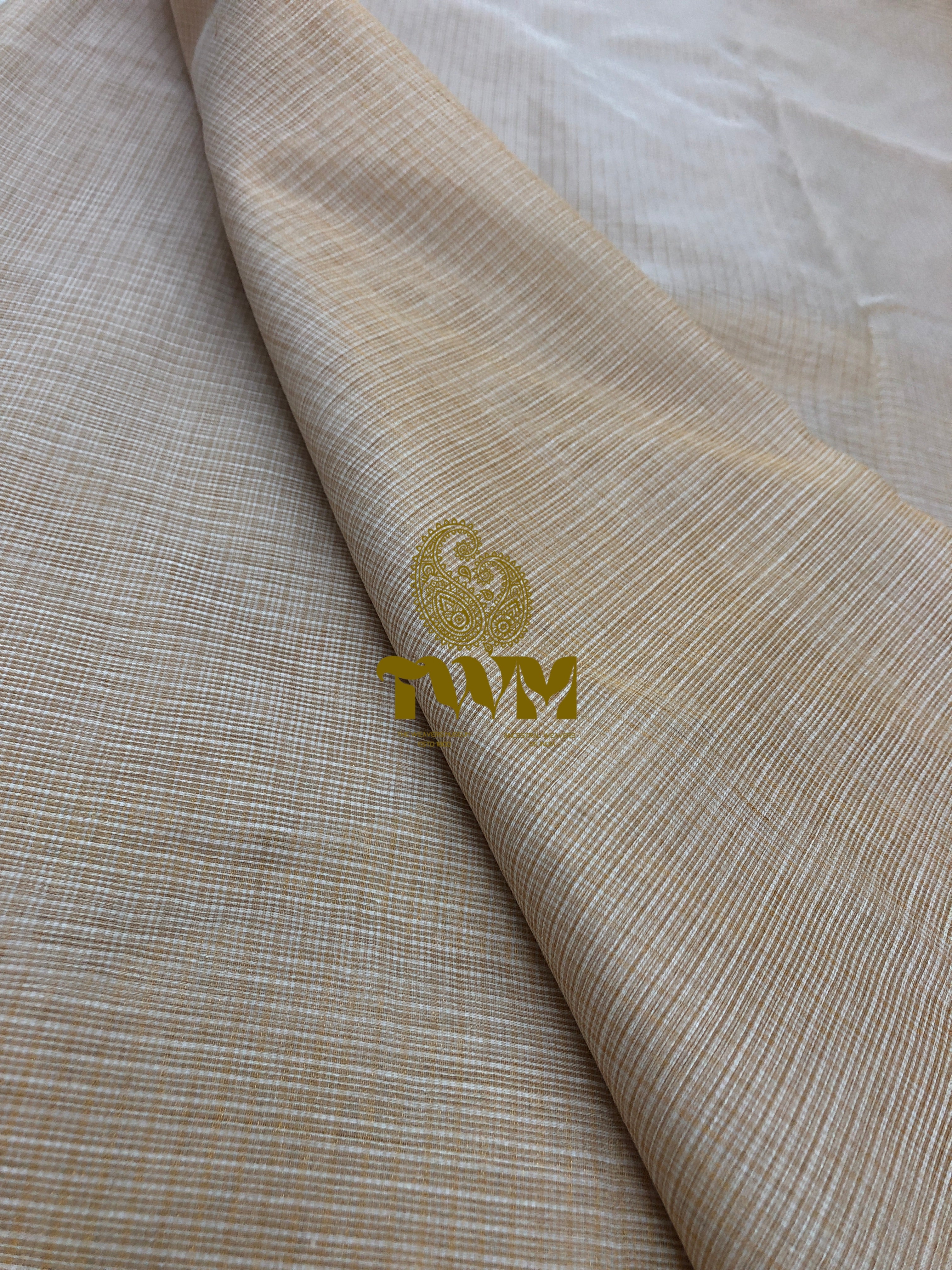 Beige fabric with a gold logo on a white background