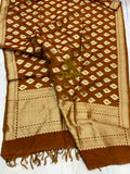 Brown and beige patterned fabric with tassels on a white background