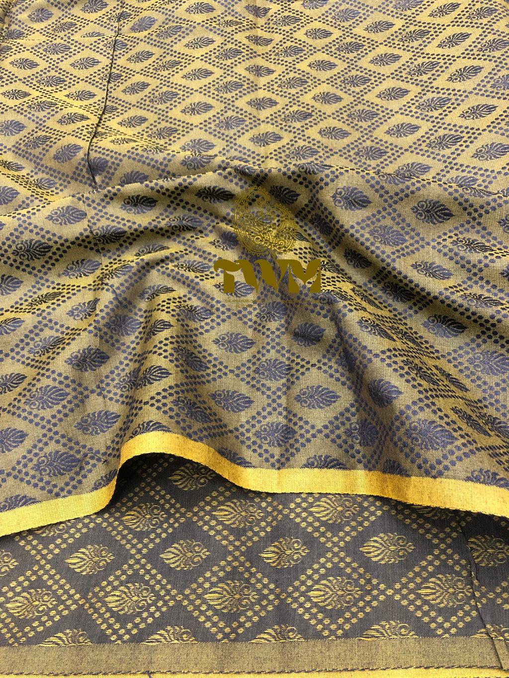 Patterned fabric with gold and blue design