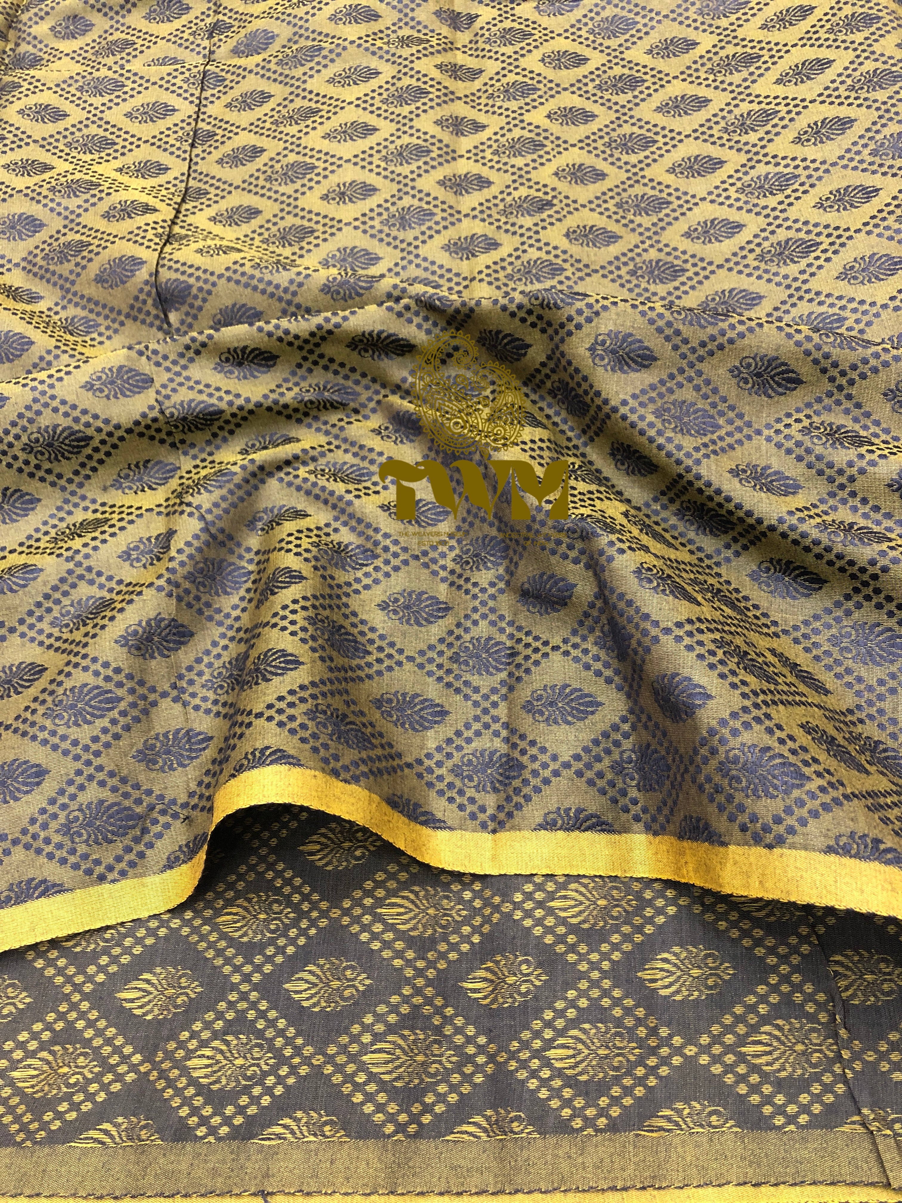 Patterned fabric with gold and blue design