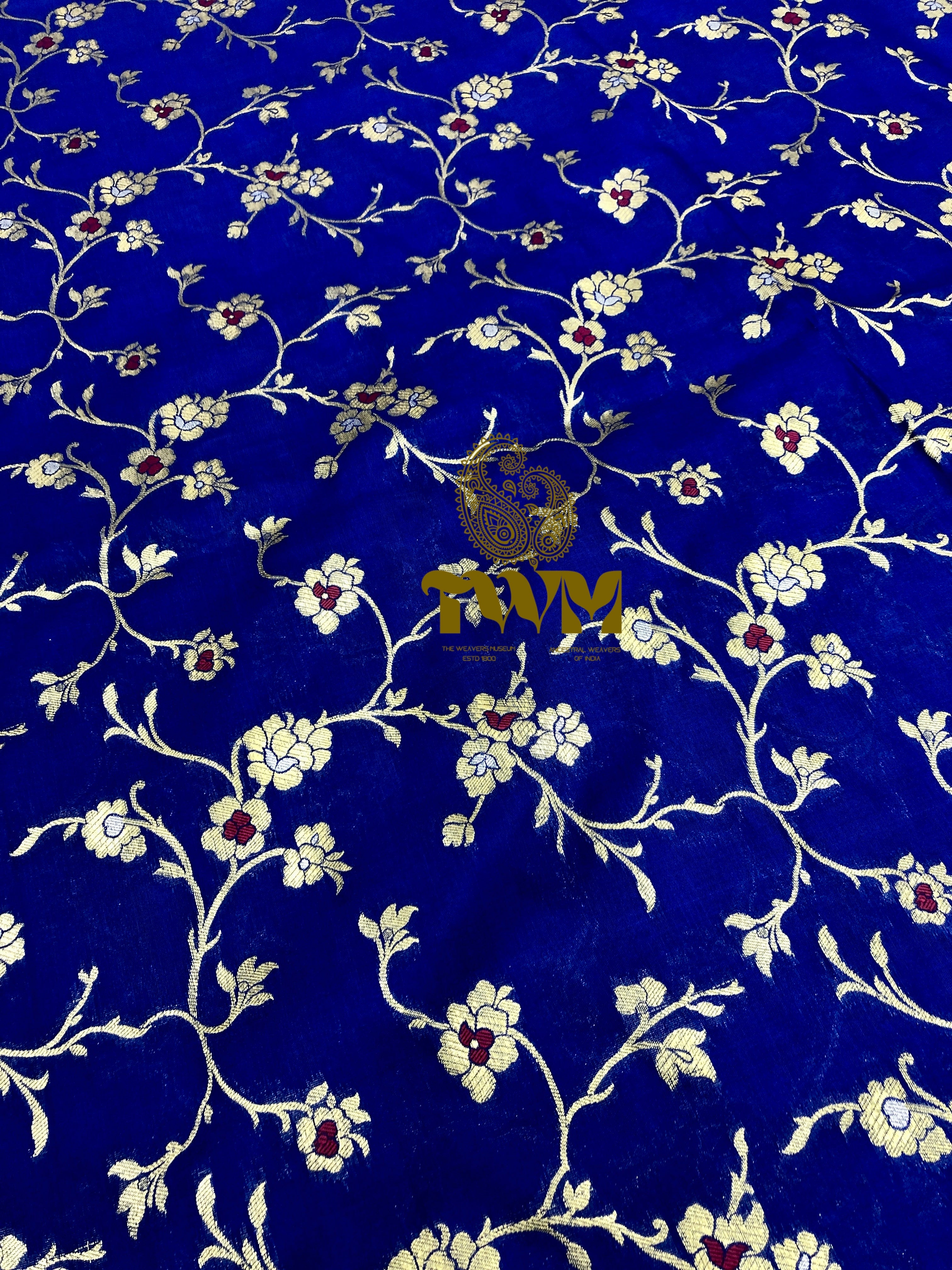 Decorative fabric with floral pattern on a blue background