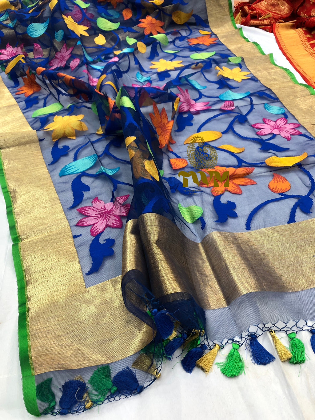 Colorful embroidered Dupatta with floral patterns and tassels on a white background