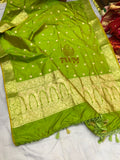 Olive Green with gold patterns and a visible brand logo on a white background