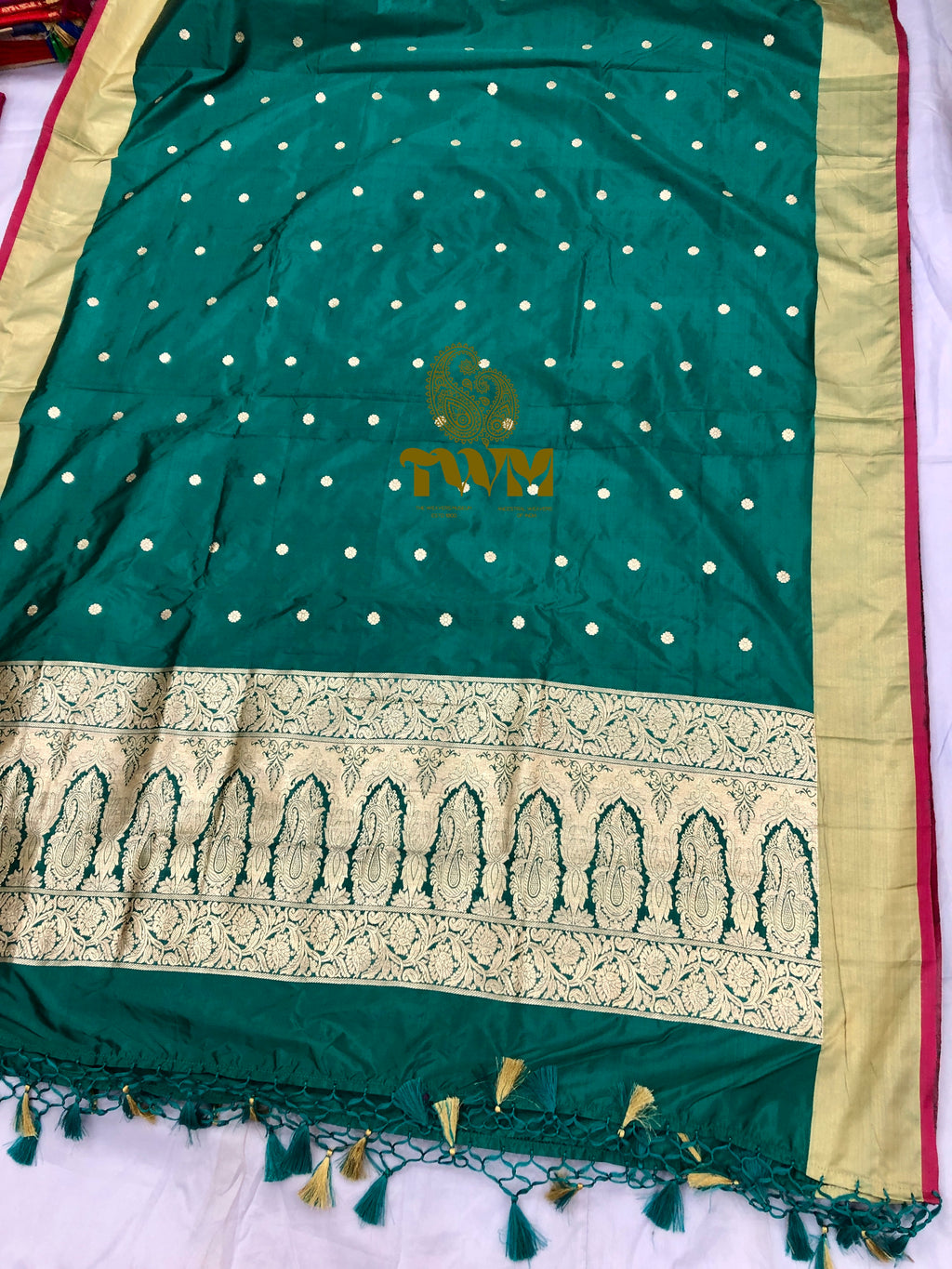 Green Dupatta with white dot pattern and gold border on a white background