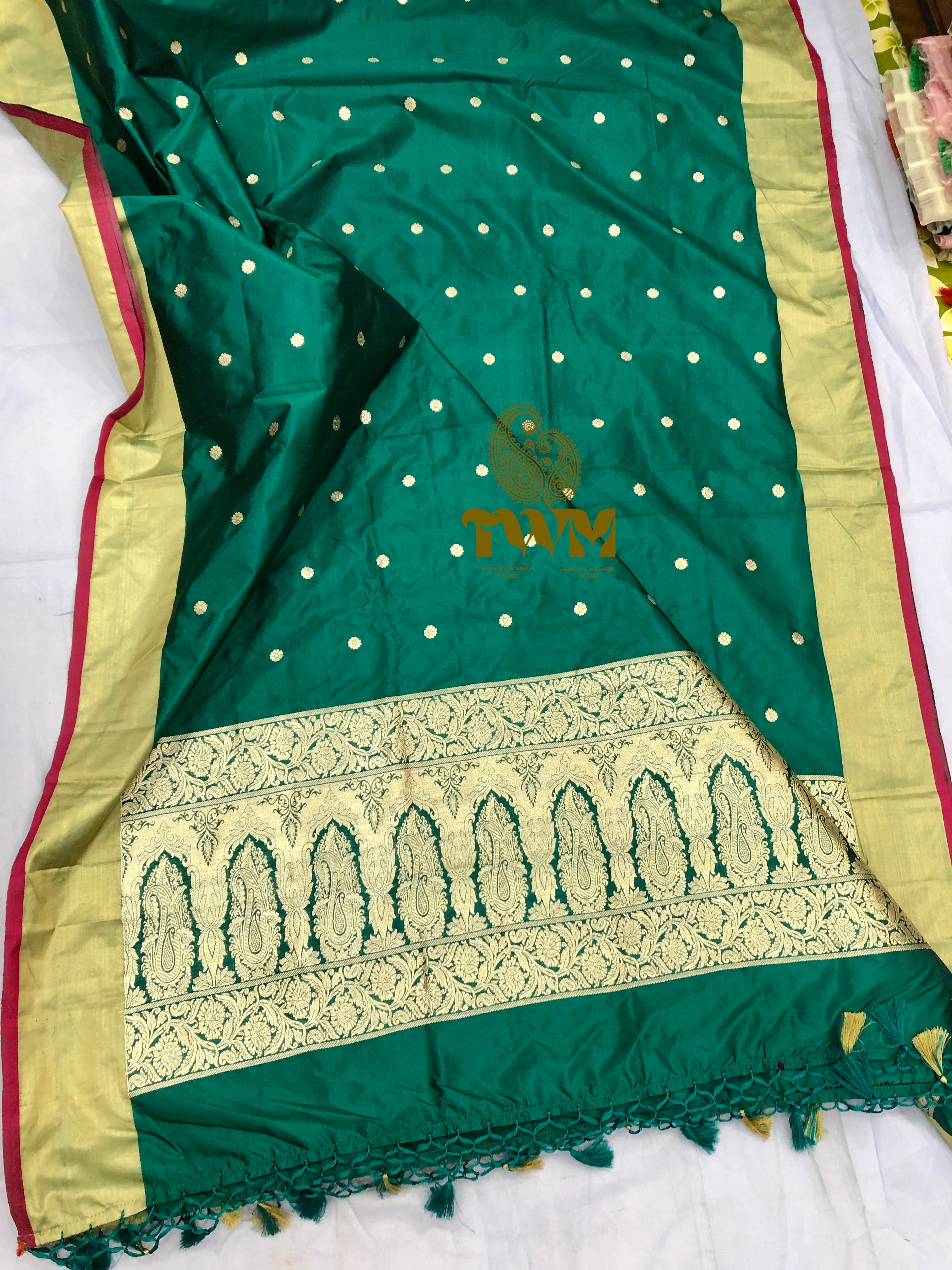 Green Dupatta with gold border and intricate patterns on a white background