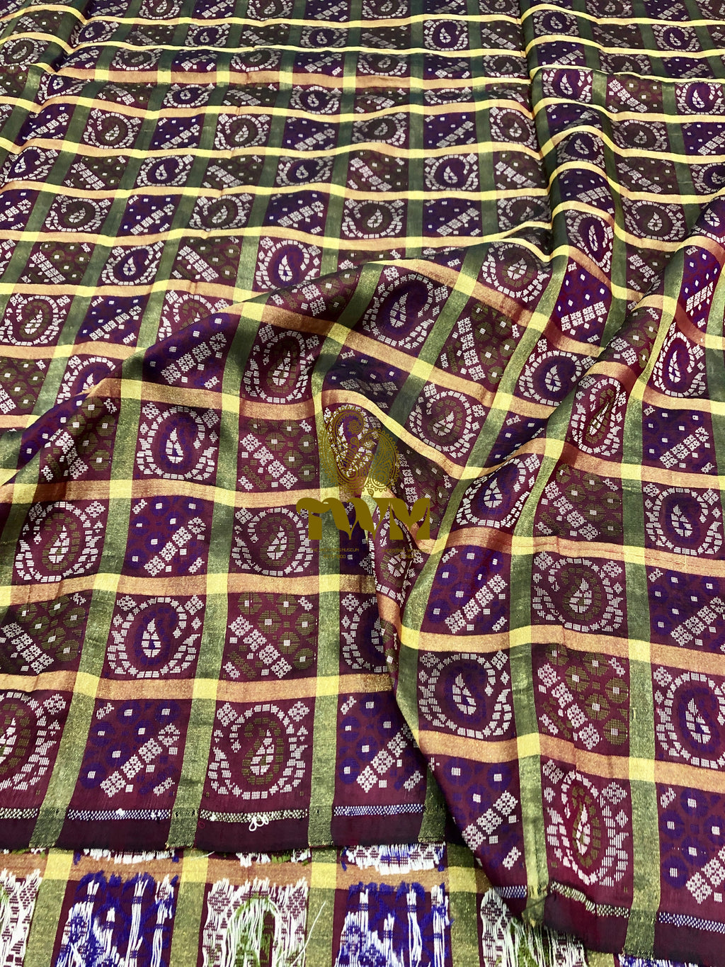 Patterned fabric with wine and green design